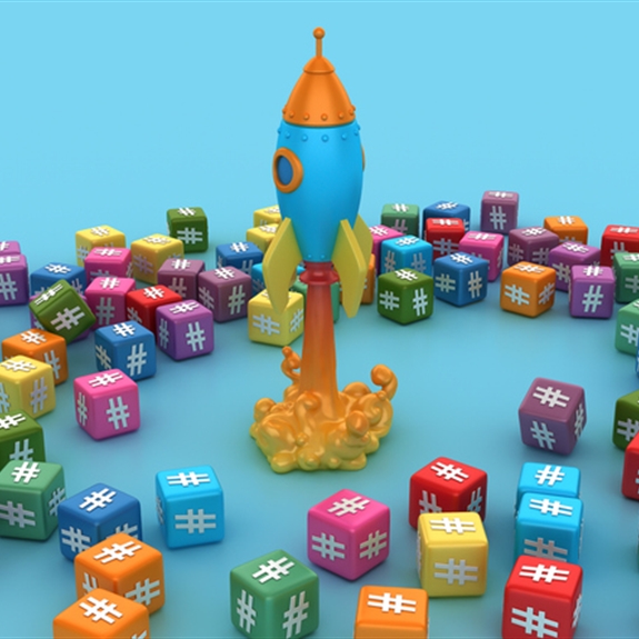Scattered blocks showing hashtag symbols and a toy rocket